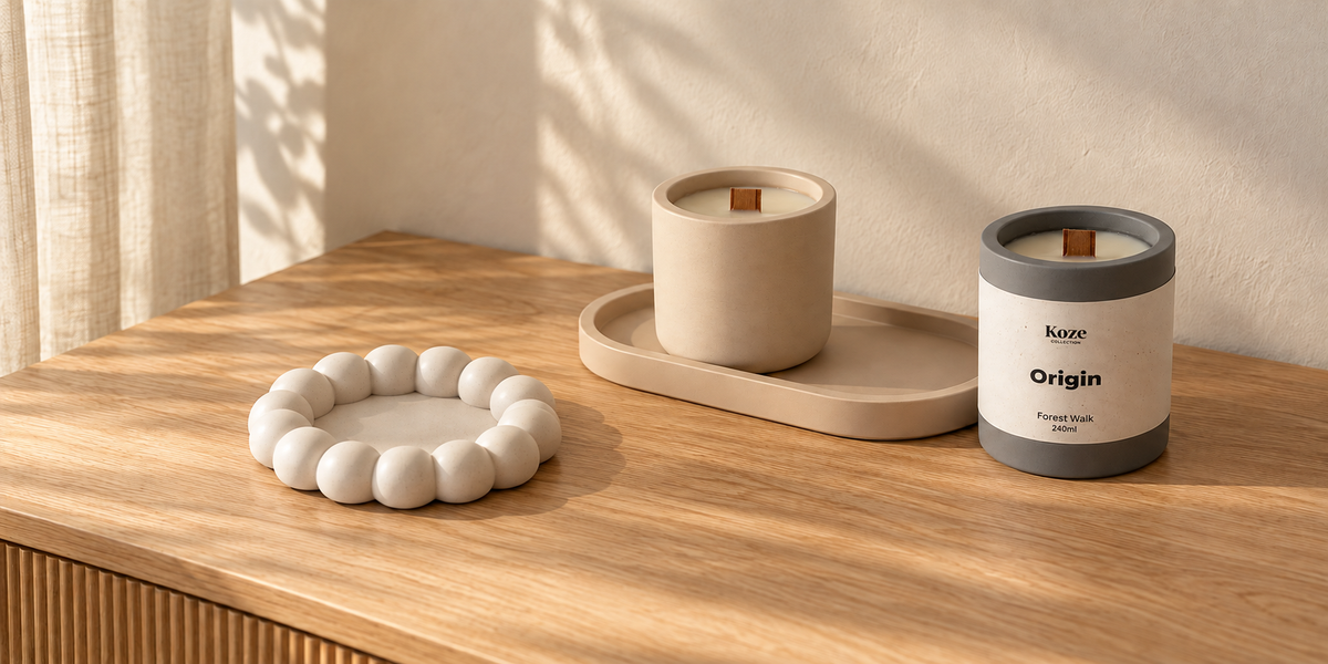 Koze handmade jesmonite trays and candles in off-white, beige and anthracite
