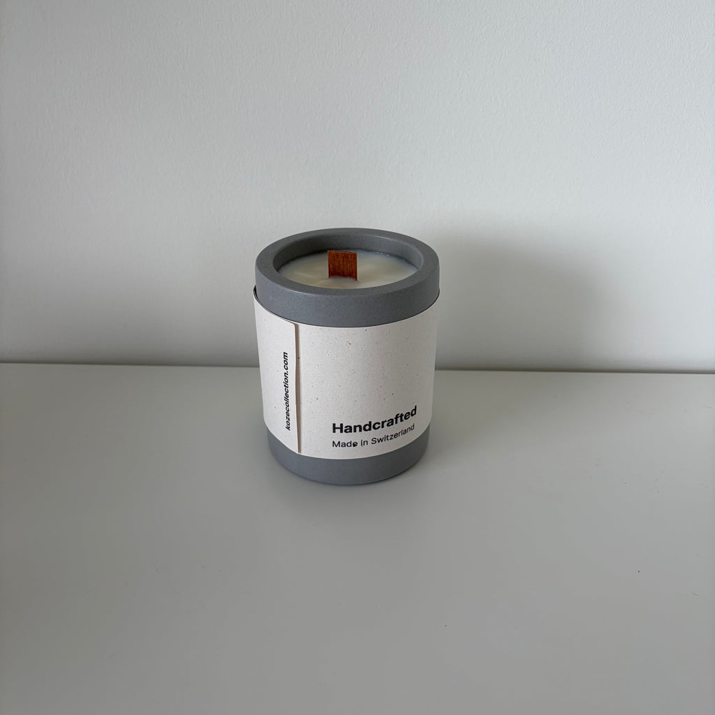 Origin Forest Walk candle with its Koze label, jesmonite pot and natural soy wax, in anthracite grey