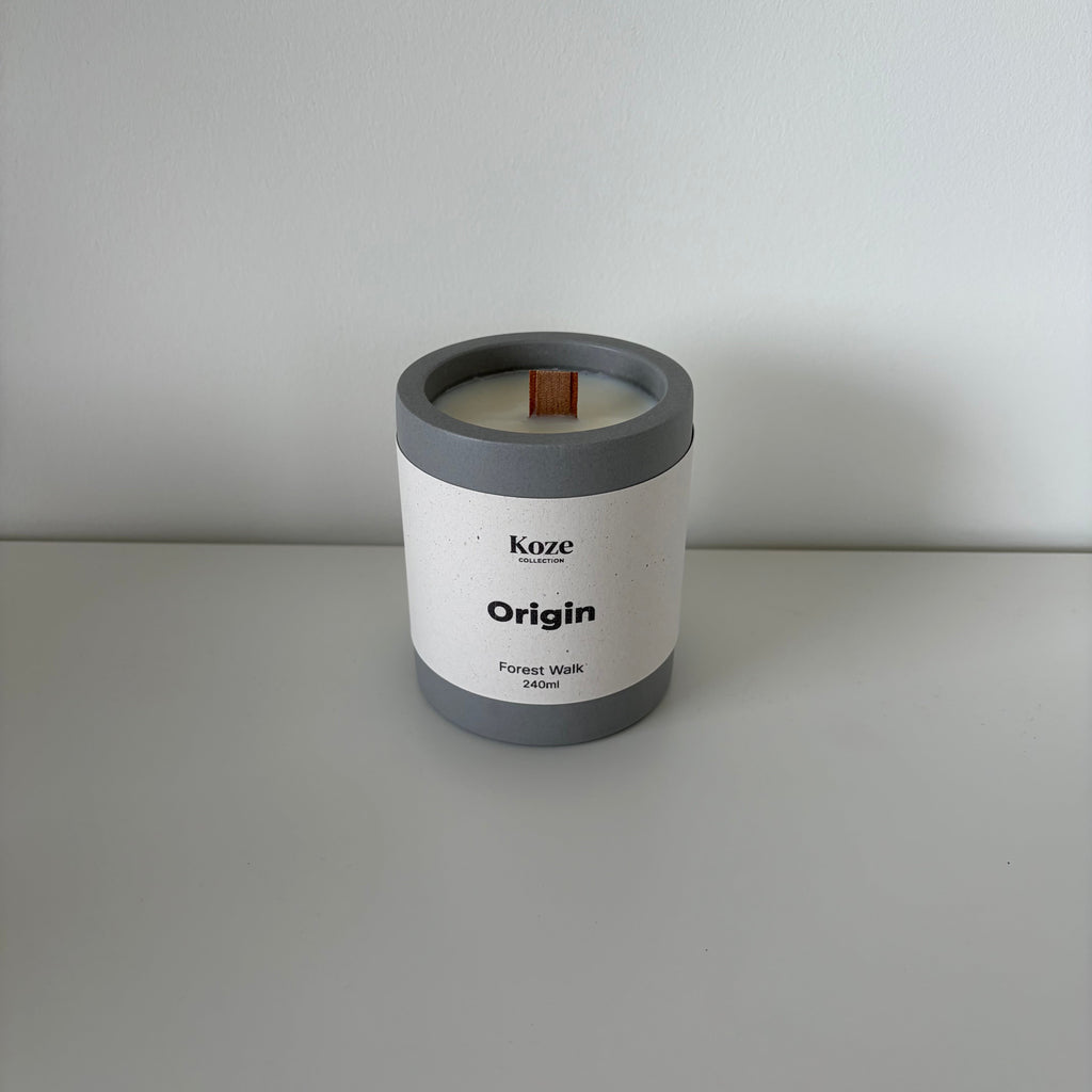 Origin Forest Walk candle in an anthracite grey jesmonite pot, handmade in Switzerland