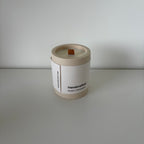 Origin Forest Walk candle with its Koze label, jesmonite pot and natural soy wax, in beige