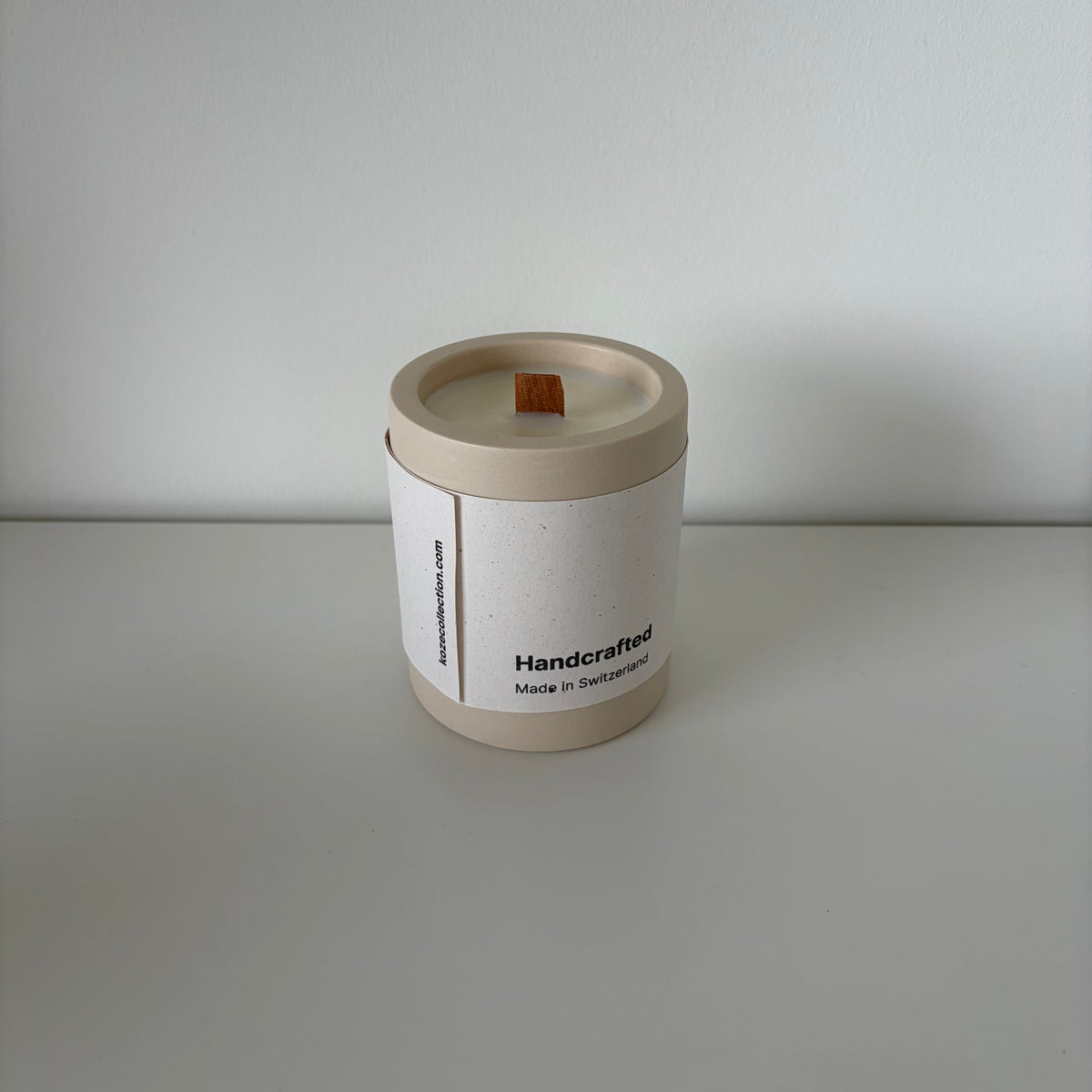 Origin Forest Walk candle with its Koze label, jesmonite pot and natural soy wax, in beige