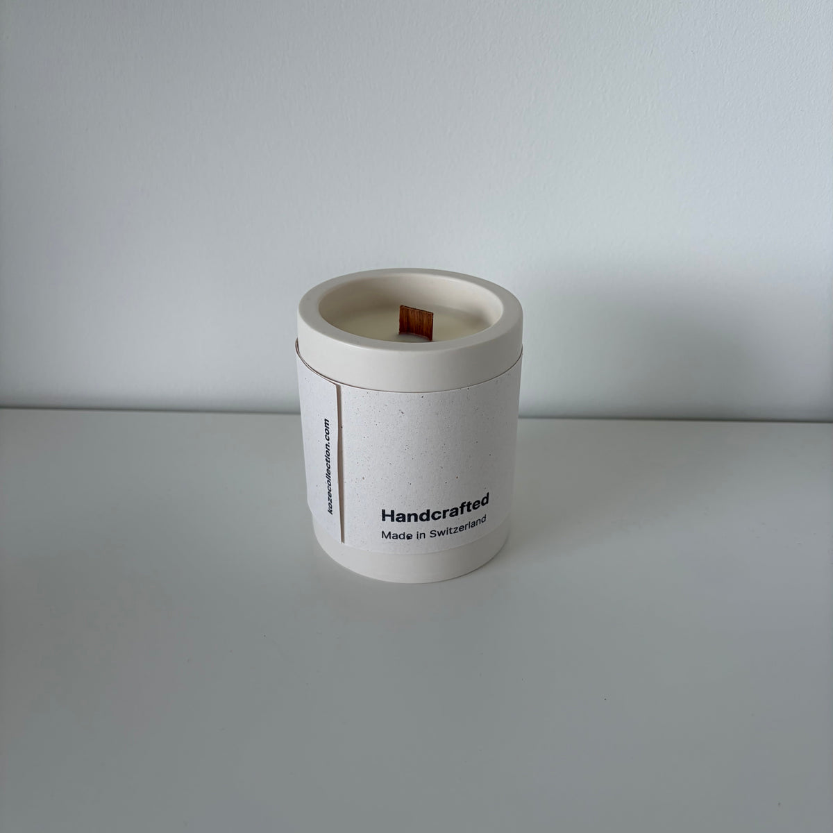 Origin Forest Walk candle with its Koze label, jesmonite pot and natural soy wax, in white